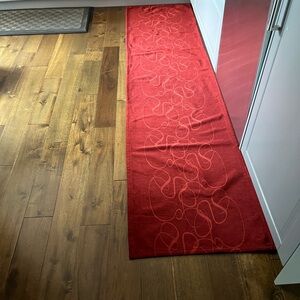 Red Runner Rug with Swirl Pattern